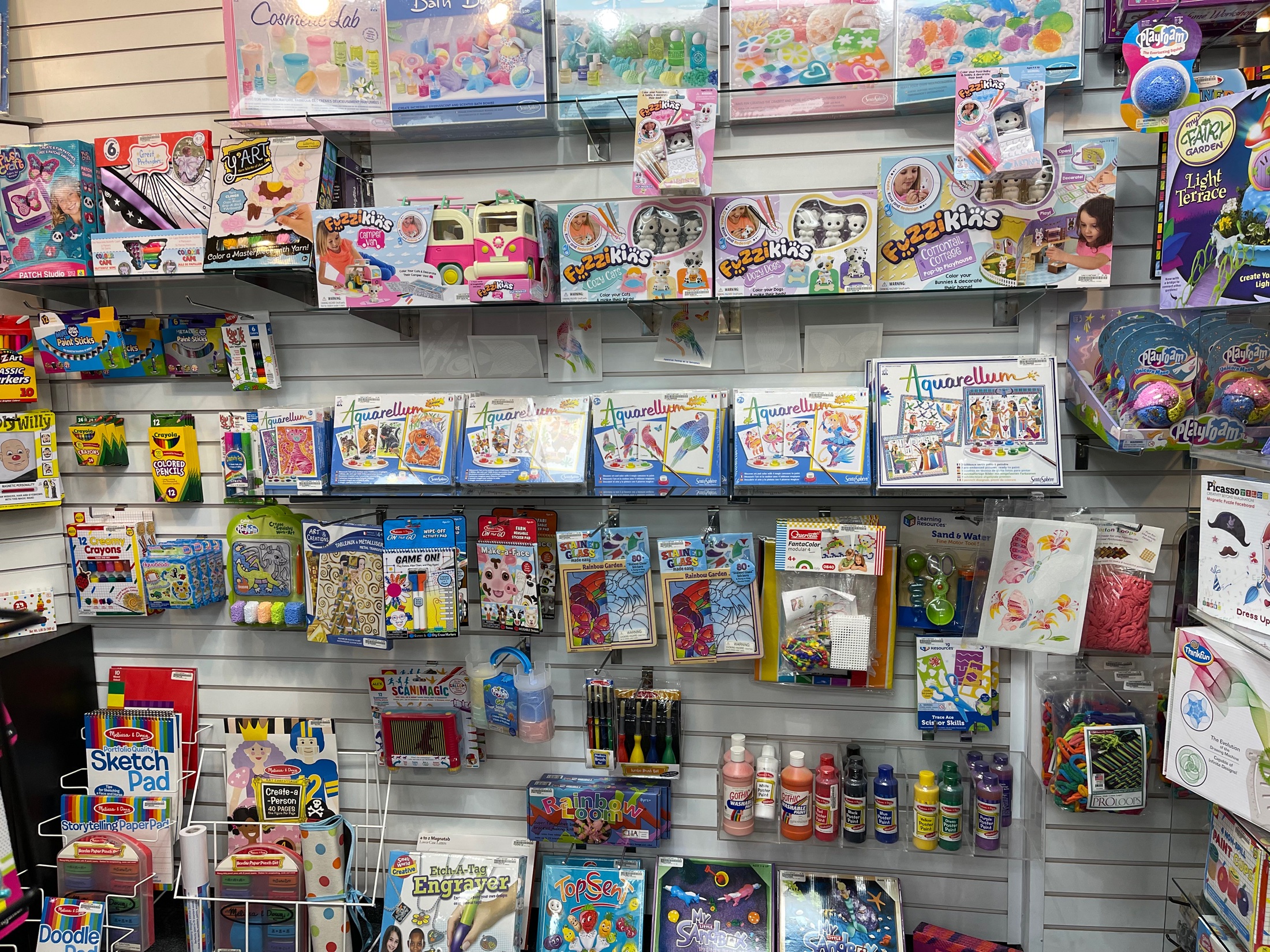 Colorful art and craft kits displayed inside LearningTower Toys